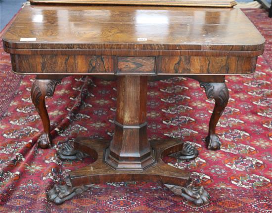 A Victorian rosewood folding-top card table, W.91cm